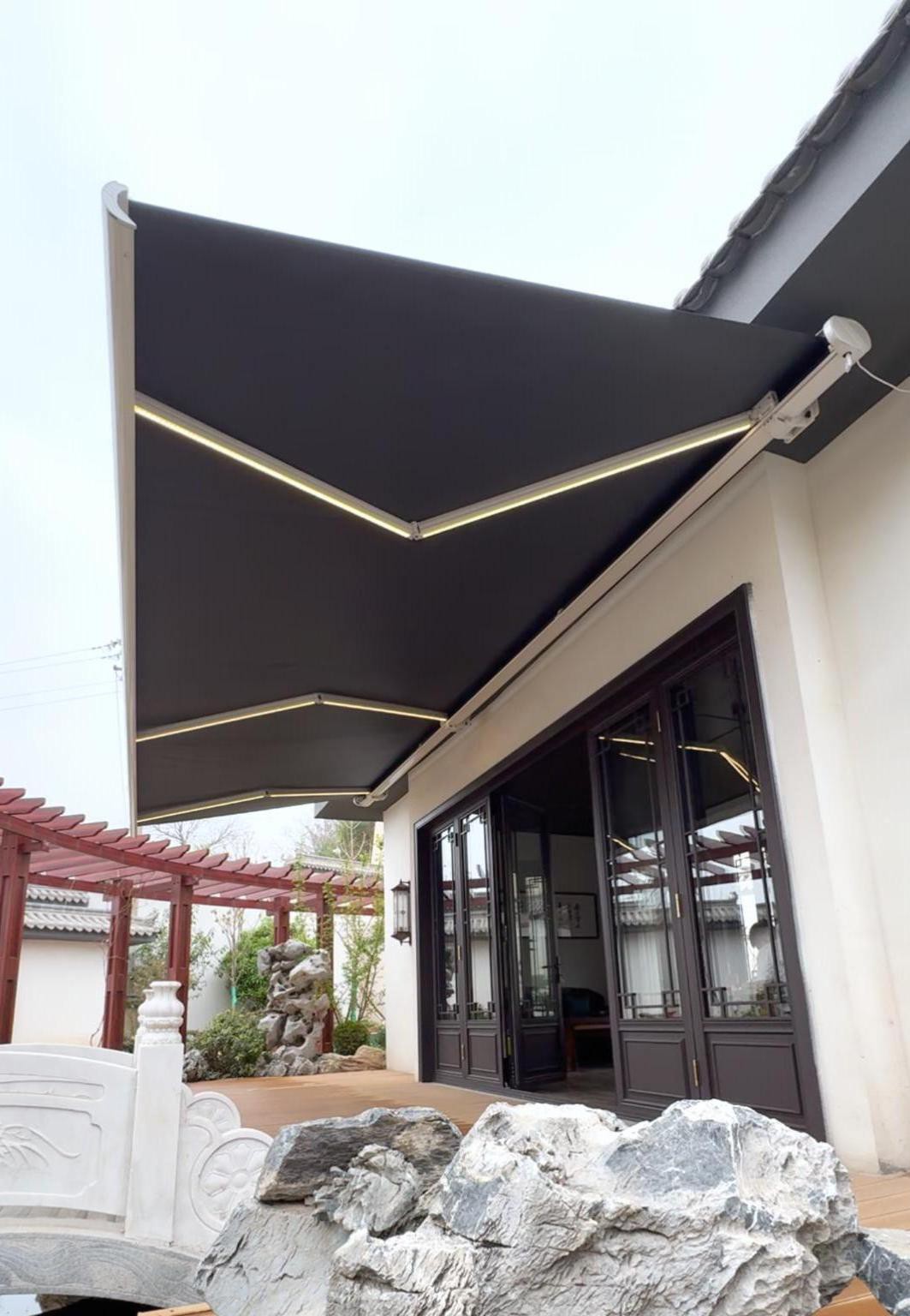 Retractable awning over an outdoor terrace